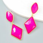 Arete geométrico fucsia, bordes Dorados