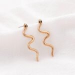 Aretes de boton con aleacion de zinc Rhea
