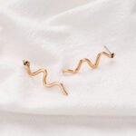 Aretes de boton con aleacion de zinc Rhea - Imagen 5