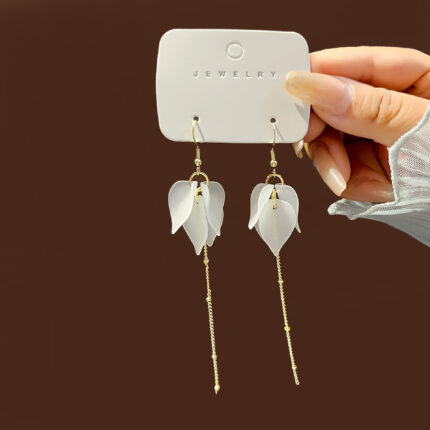 Aretes con resina y aleacion de zinc Tique