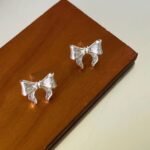 Aretes de lazos con aleacion de zinc Dione - Imagen 4