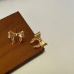 Aretes de lazos con aleacion de zinc Dione - Imagen 5